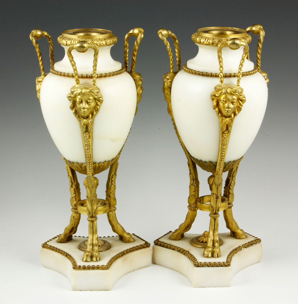 Appraisal: - Marble and Bronze Garnitures Two garnitures dore marble and