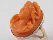 Appraisal: A carved coral cameo ring with a yellow metal tests