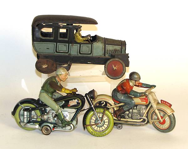 Appraisal: German clockwork toys Including a Technofix and Arnold Motorcycle s