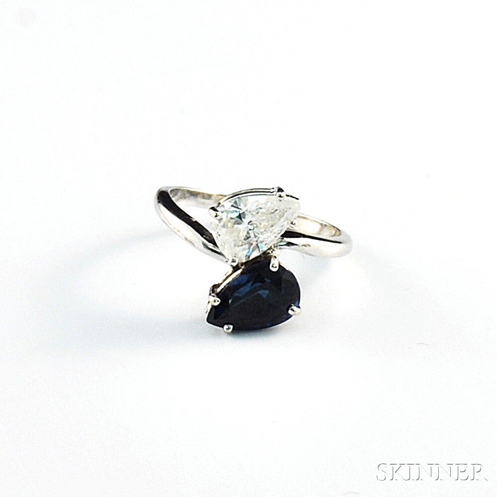 Appraisal: kt White Gold Sapphire and Diamond Twin-stone Bypass-style Ring the