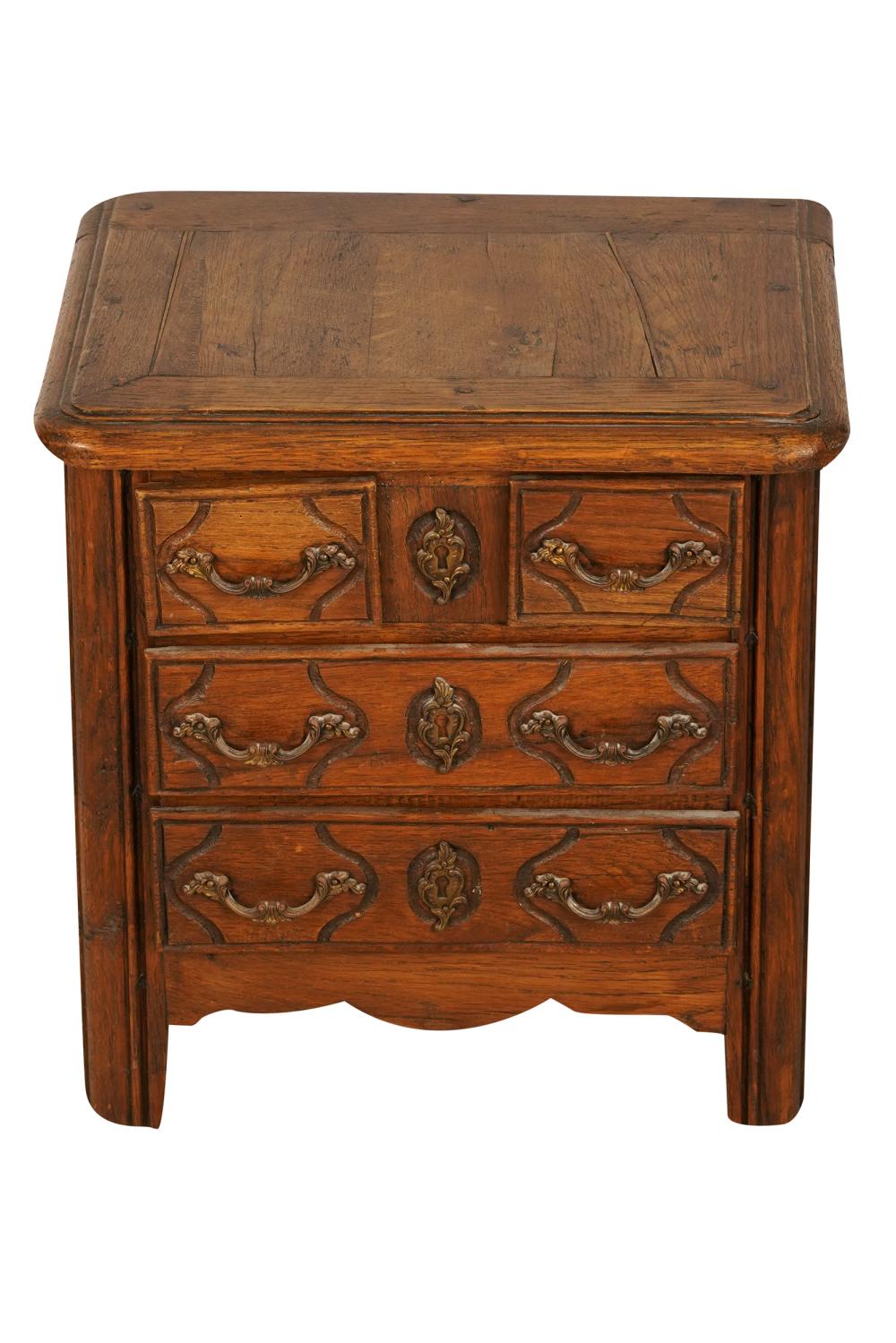 Appraisal: DIMINUTIVE REGENCE STYLE CARVED OAK CHEST OF DRAWERShaving two short