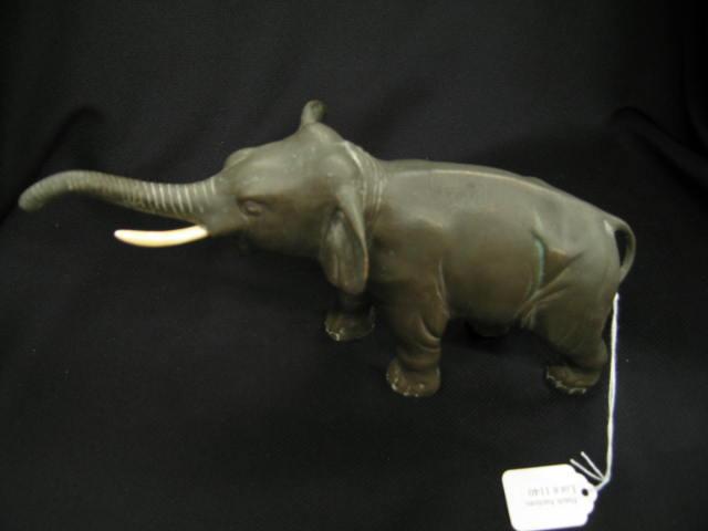 Appraisal: Bronze Statue of an Elephant ivory tusk circa tall long