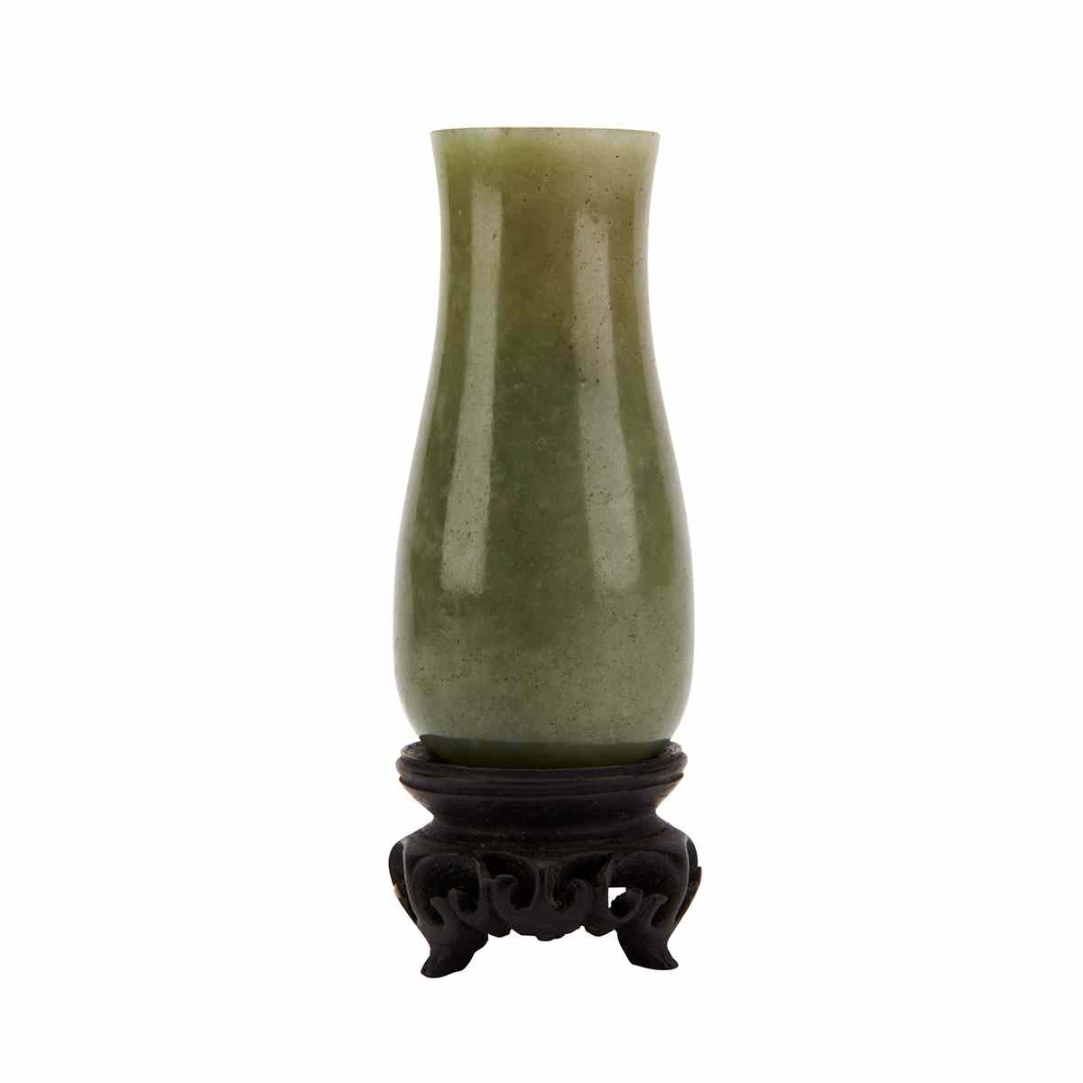 Appraisal: Green Jade Vase th Century The smooth and unadorned sides