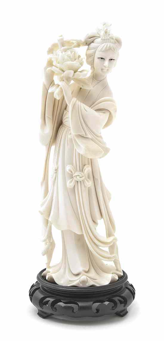 Appraisal: A Chinese Ivory Figure depicting a lady in flowing robes