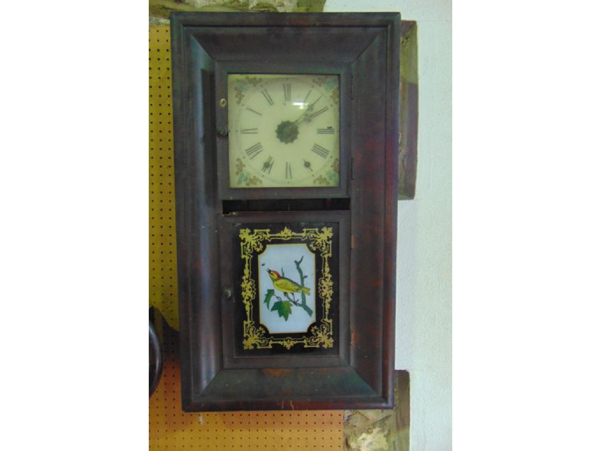 Appraisal: An American wall clock in ogee case by Jerome Co