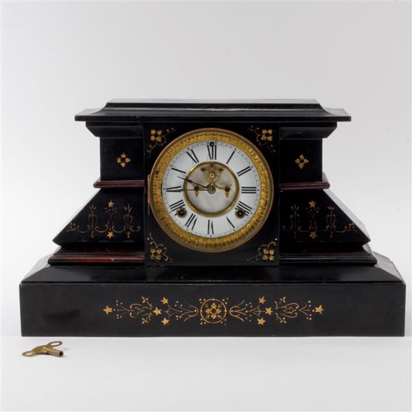 Appraisal: Ansonia ebonized cast iron mantle clock with gilt detail and