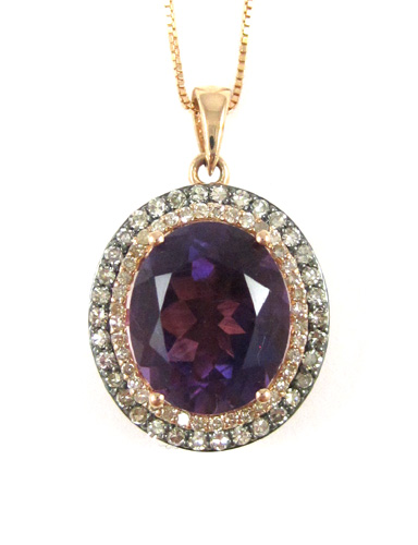 Appraisal: AMETHYST AND DIAMOND PENDANT NECKLACE suspended on a k rose