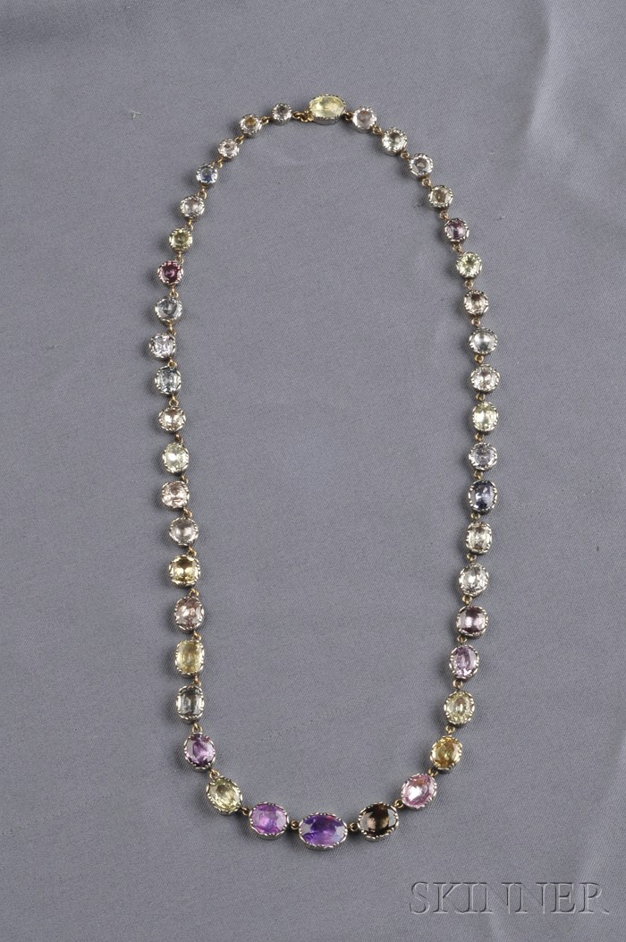 Appraisal: Multicolored Sapphire Necklace set with fancy-shaped multicolored foil-backed sapphires in