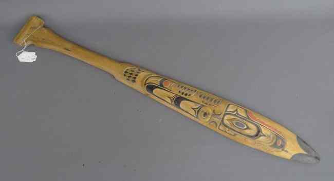 Appraisal: Carved wooden polychrome painted Northwest Coast paddle '' Length