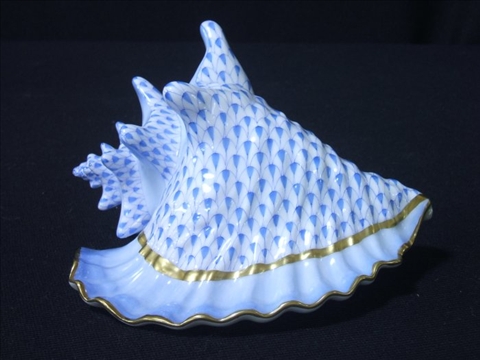 Appraisal: HEREND CONCH SHELL FIGURE with blue fishnet - h w