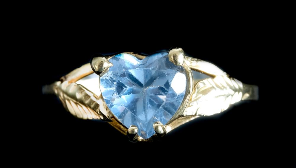 Appraisal: K YELLOW GOLD HEART SHAPED BLUE TOPAZ RING k yellow