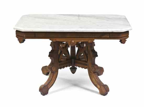 Appraisal: A Victorian Walnut Low Table having a rectangular white marble