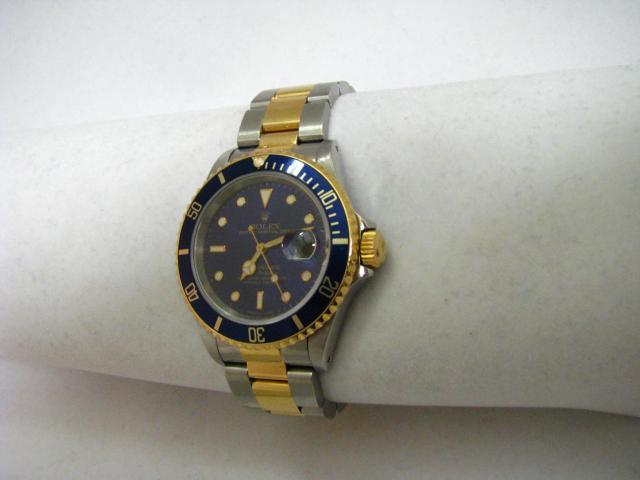 Appraisal: Gentleman's K gold and stainless Submariner Rolex blue on blue