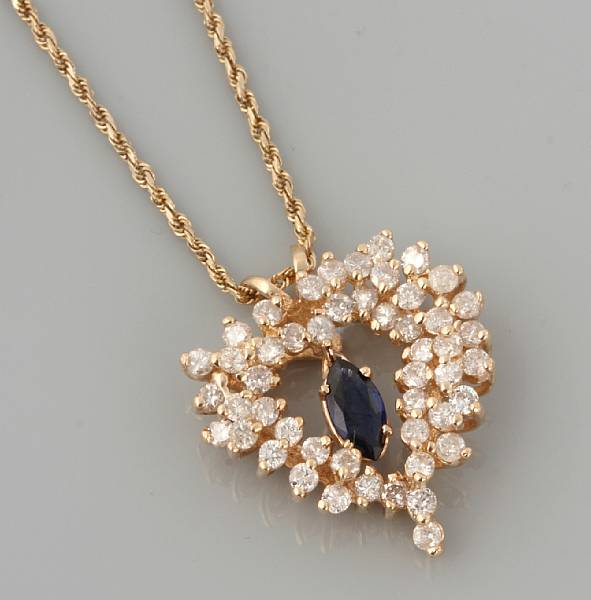 Appraisal: A diamond sapphire and k gold heart pendant with chain