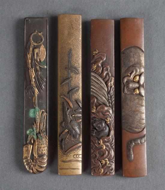 Appraisal: Four Japanese mixed metal animal-theme kozuka knife handles th Century