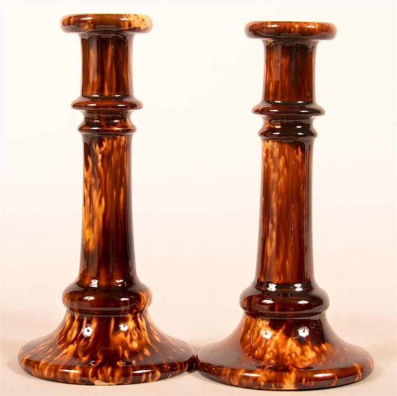 Appraisal: Pair Rockingham Glaze Yellowware Candlesticks Pair of Rockingham Glaze Yellowware