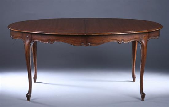 Appraisal: LOUIS XV STYLE OVAL FRUITWOOD DINING TABLE th century with