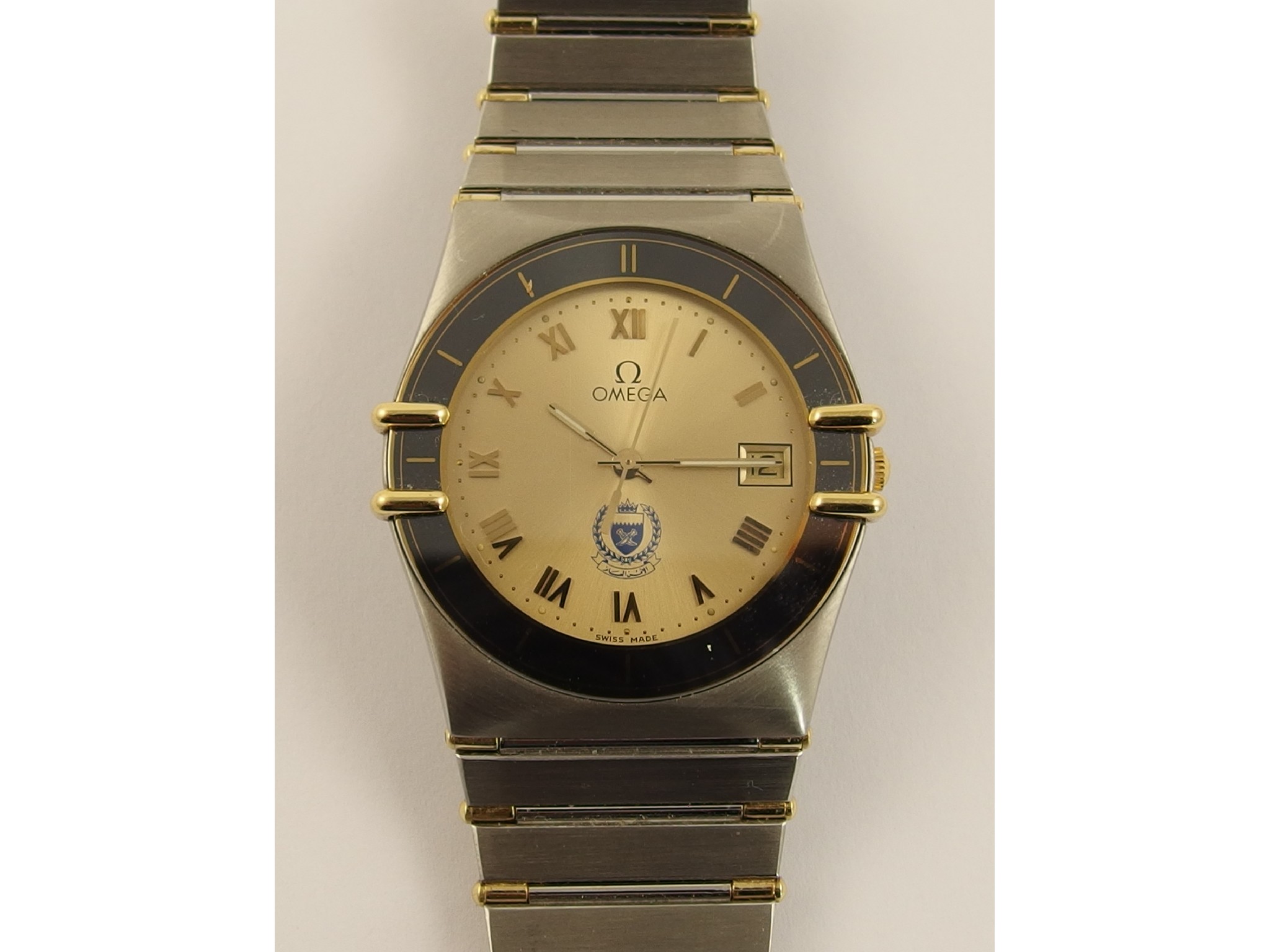 Appraisal: A stainless steel Omega constellationthe gold coloured dial has Roman