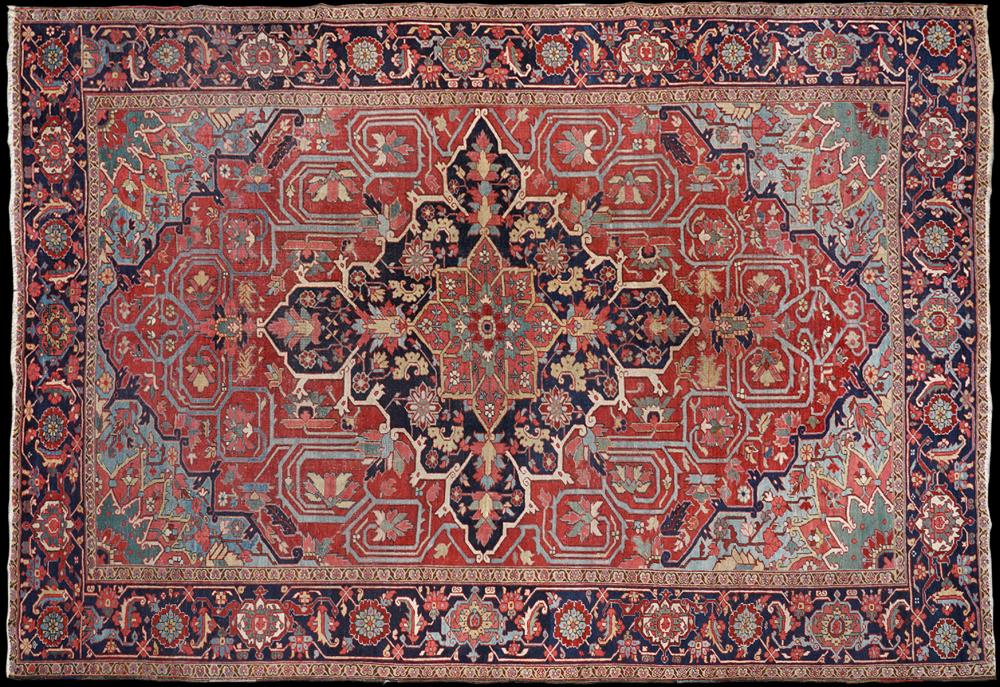 Appraisal: ANTIQUE SERAPI CARPETAntique Serapi carpet in blues and reds Serapi