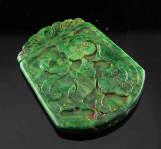 Appraisal: A Chinese jadeite pendant ins Estimate - Descriptions provided in