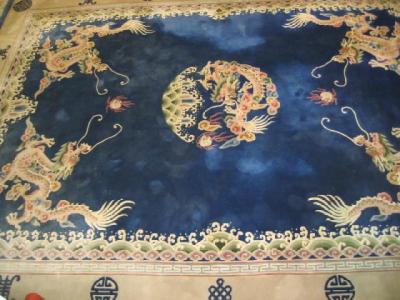 Appraisal: A CHINESE WASHED AND FRINGED CARPET th century the Royal