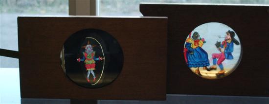 Appraisal: Two adjustable coloured magic lantern slides two dancing figures and