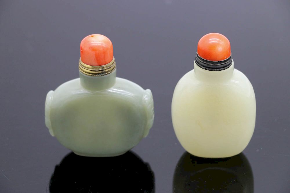 Appraisal: TWO CELADON JADE SNUFF BOTTLES QING The group comprising of