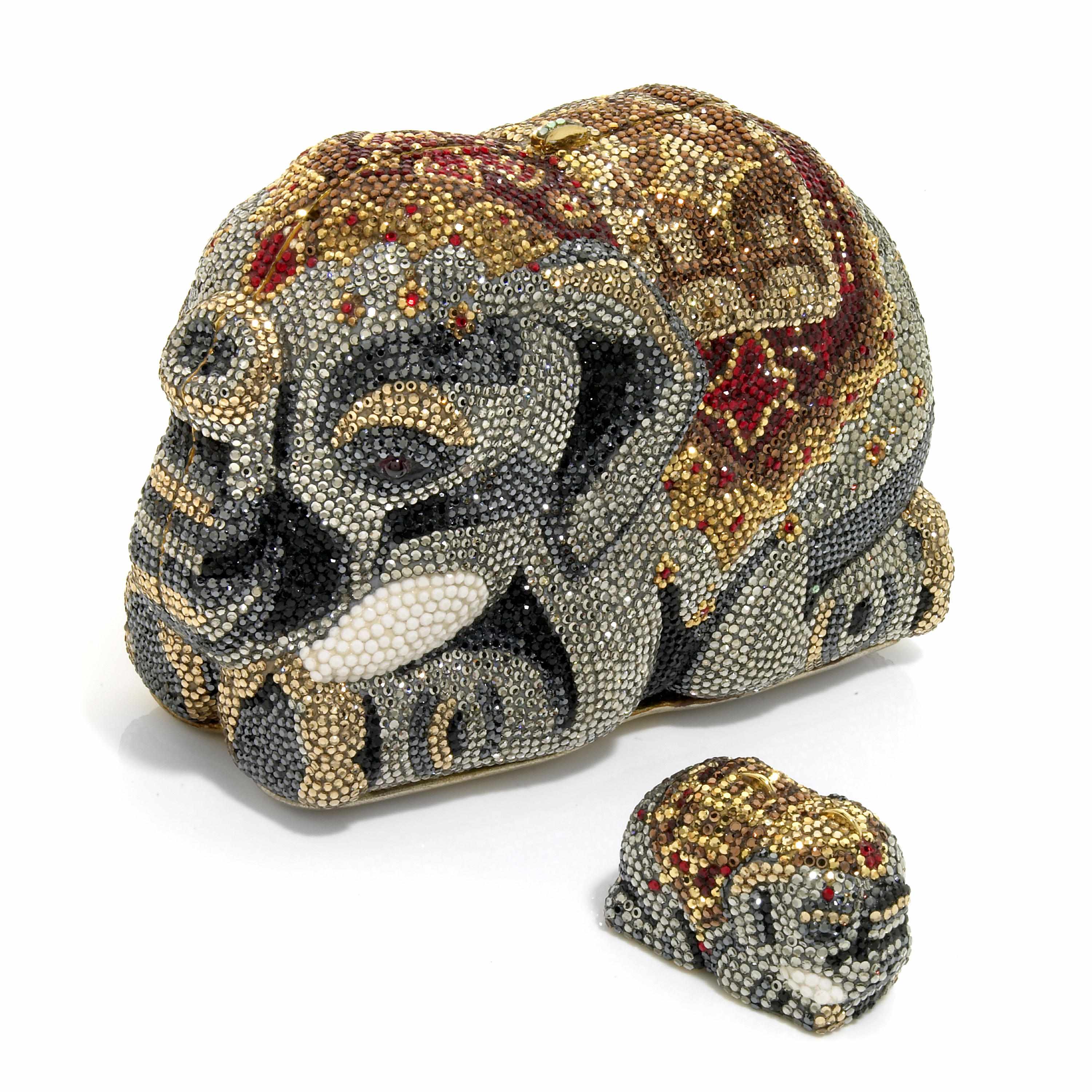 Appraisal: A multi-colored crystal laying down Maharaja elephant minaudiere with matching