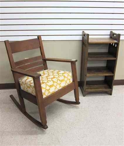 Appraisal: AMERICAN ARTS CRAFTS OAK ROCKER AND SMALL BOOKCASE the low-back