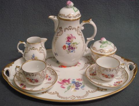 Appraisal: Floral decorated German porcelain teaset teapot creamer sugar cups and