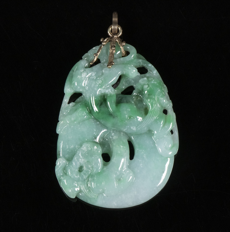 Appraisal: GREEN JADE PENDANT Chinese carved green jade dragon pendant with