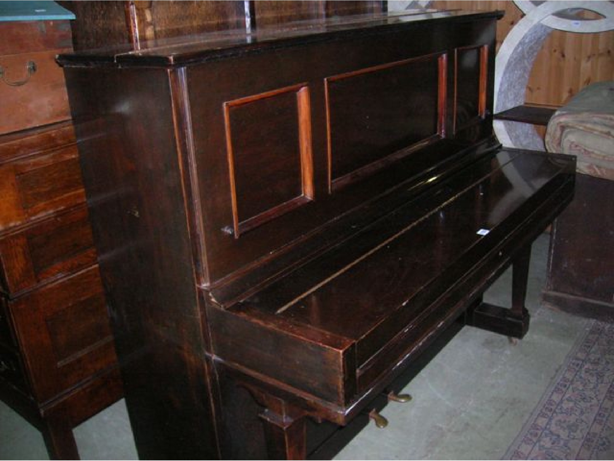 Appraisal: A Steinway and sons iron framed upright and overstrung piano