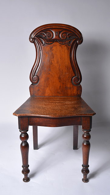 Appraisal: A Victorian mahogany carved hall chair