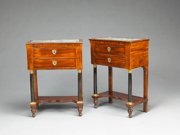 Appraisal: A pair of Neoclassical parcel ebonized and gilt bronze mounted