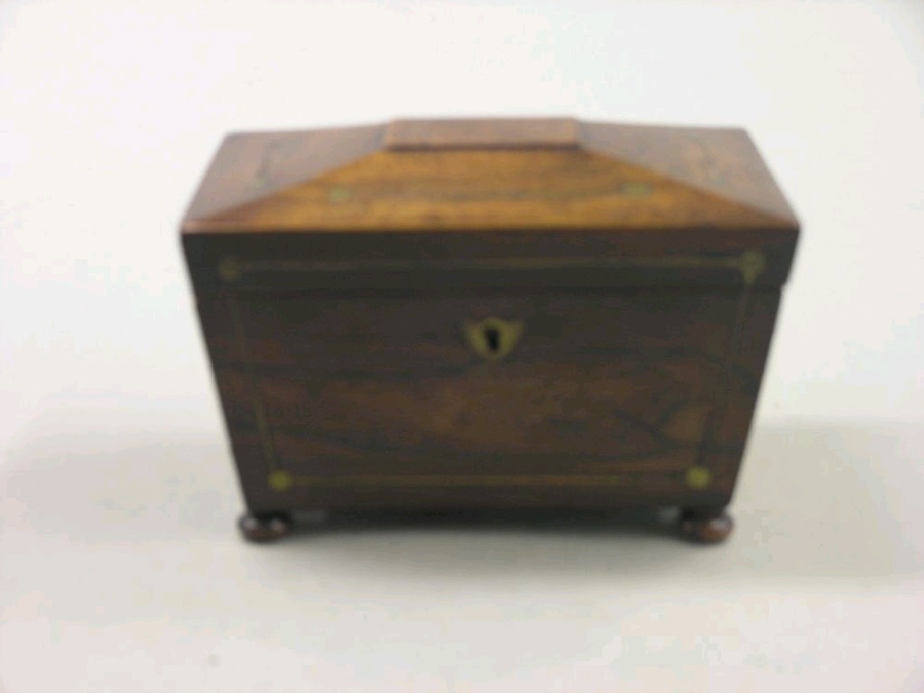 Appraisal: An early th century rosewood tea caddy sarcophagus shape with