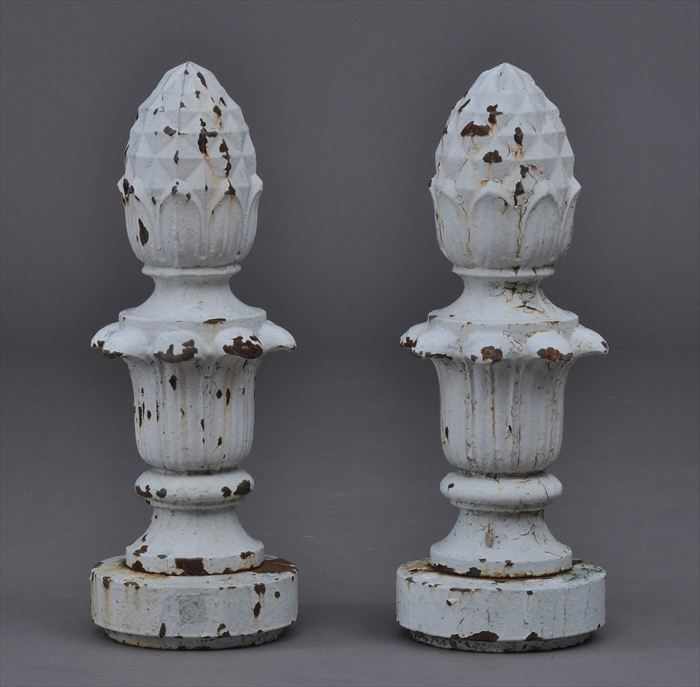 Appraisal: PAIR OF WHITE-PAINTED CAST-IRON GARDEN ORNAMENTS Numbered each pineapple finial