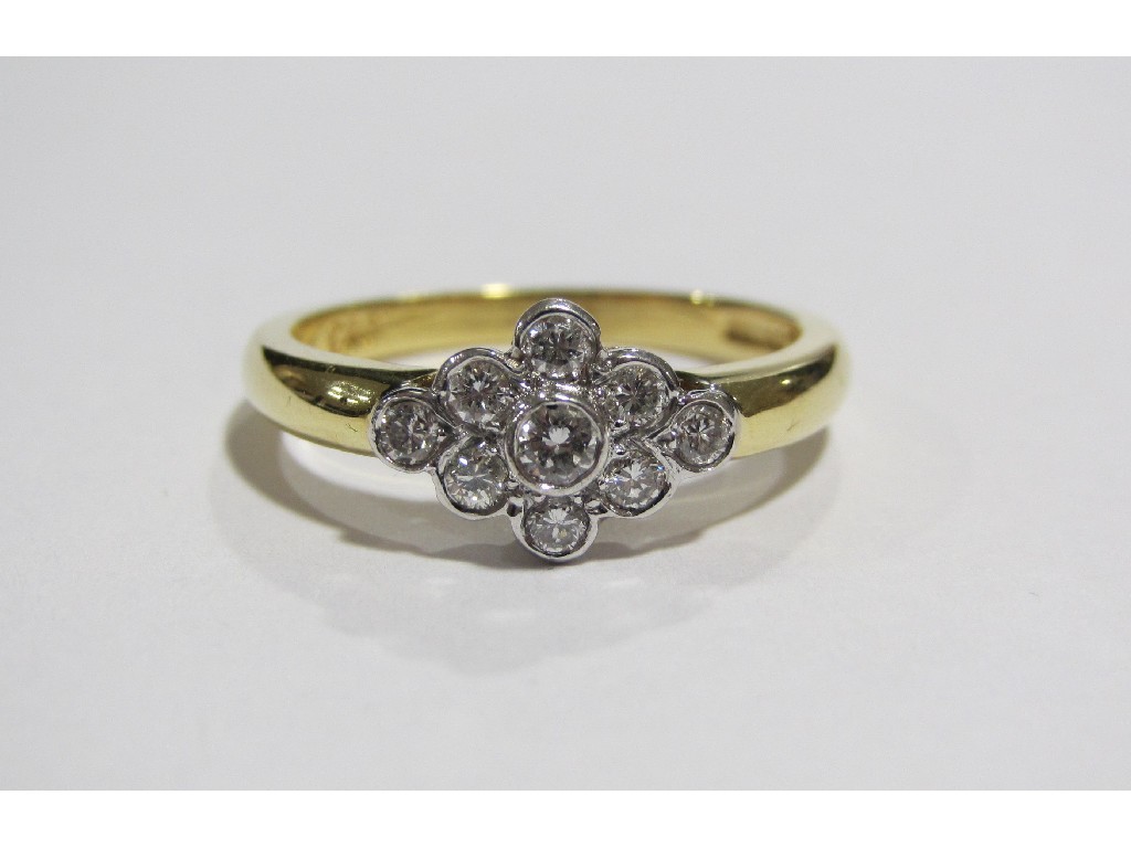 Appraisal: An eighteen carat bi colour gold diamond solitaire ring with