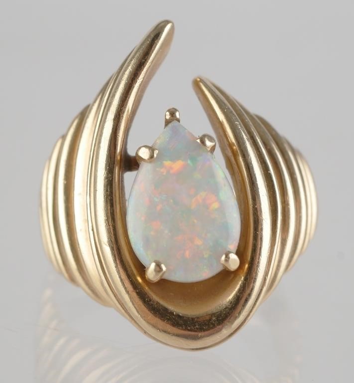 Appraisal: k yellow gold opal ring with one pear cabochon cut