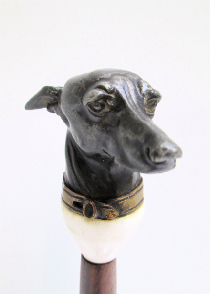 Appraisal: HOUND DOG MAGNIFYING GLASS set with a metal formed hound