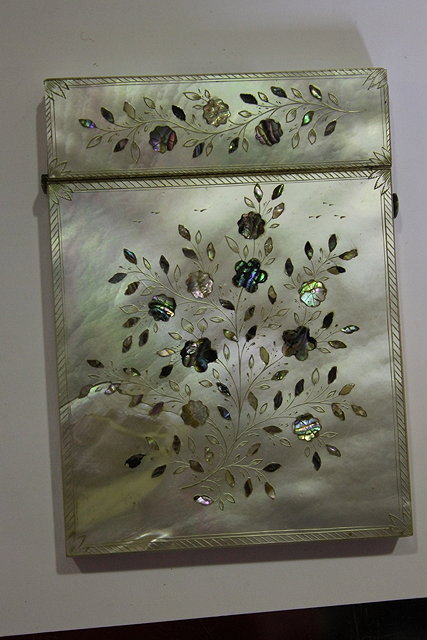 Appraisal: A VICTORIAN MOTHER-OF-PEARL CARD CASE with inlaid floral decoration