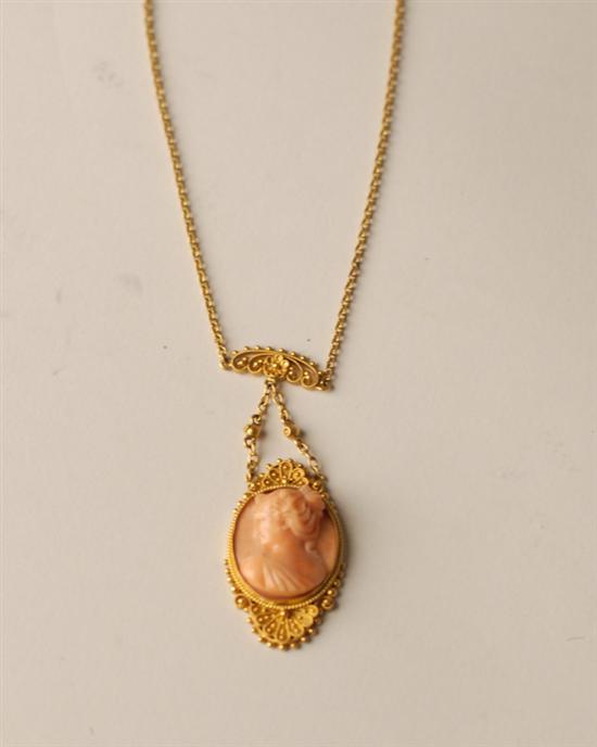 Appraisal: A Gold and Coral Cameo Necklace the coral cameo set