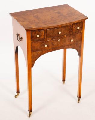 Appraisal: A burr yew bowfronted side table by Titchmarsh Goodwin fitted