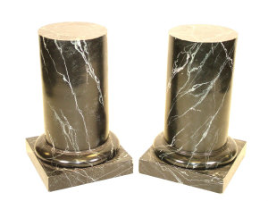 Appraisal: A pair of faux marble cylindrical pedestals with moulded collar