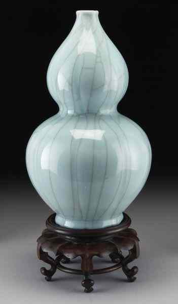 Appraisal: Chinese Qing celadon double gourd ge-glazed vase ''H Circa -