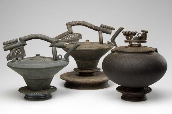 Appraisal: TIM MATHER Two glazed stoneware teapots on stands and one