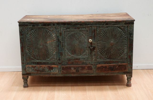 Appraisal: An Anglo Indian chest on four legs three panels on