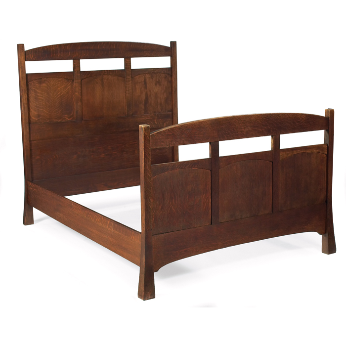 Appraisal: Arts and Crafts bed double-size with arched and paneled head