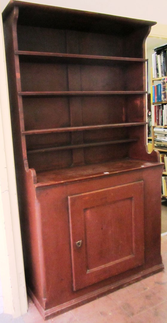 Appraisal: A th century red painted pine dresser the enclosed three