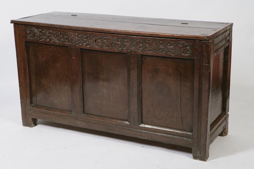 Appraisal: A CHARLES II OAK COFFER with a rectangular top above