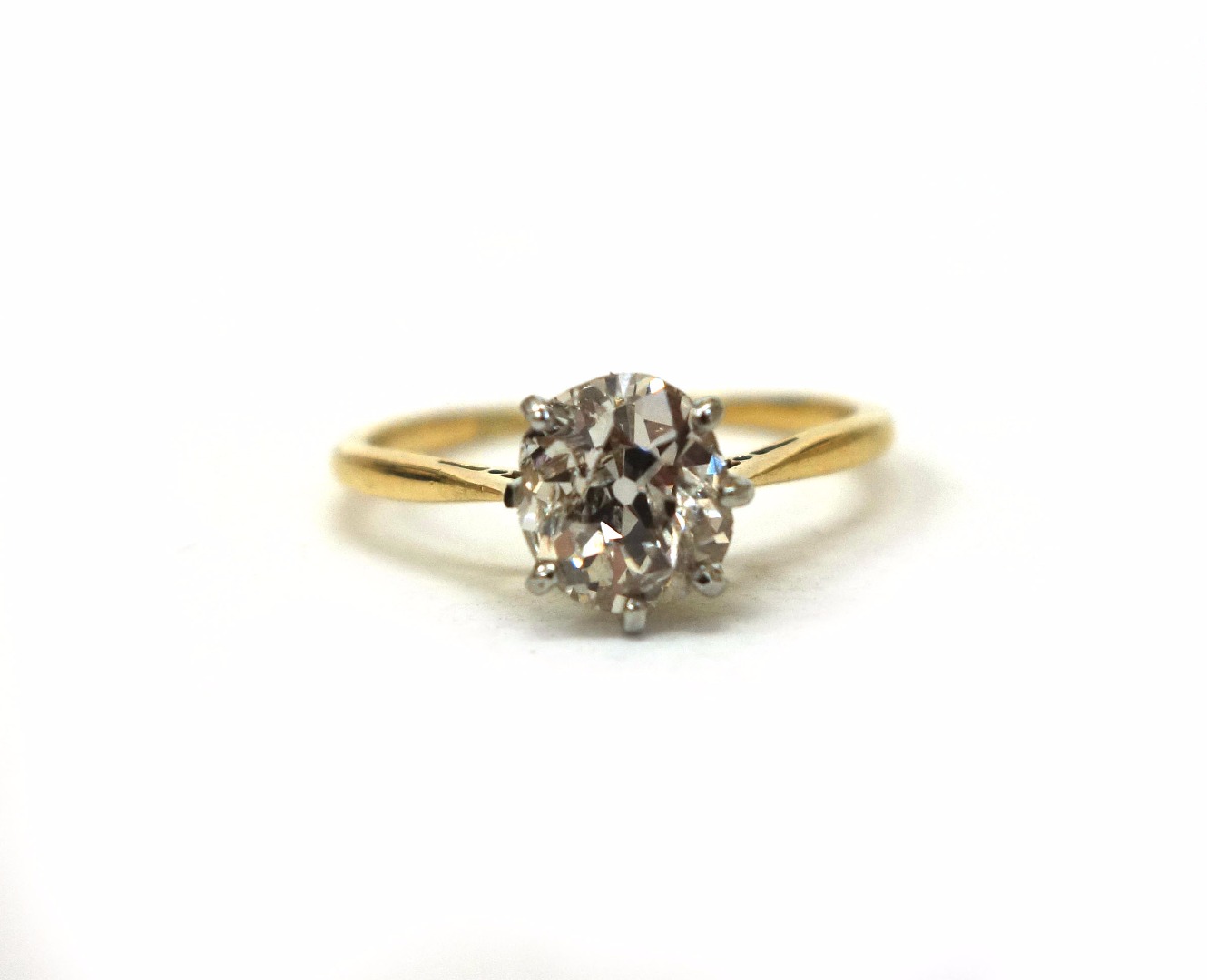 Appraisal: A diamond solitaire ring the old-cut stone approx cts claw